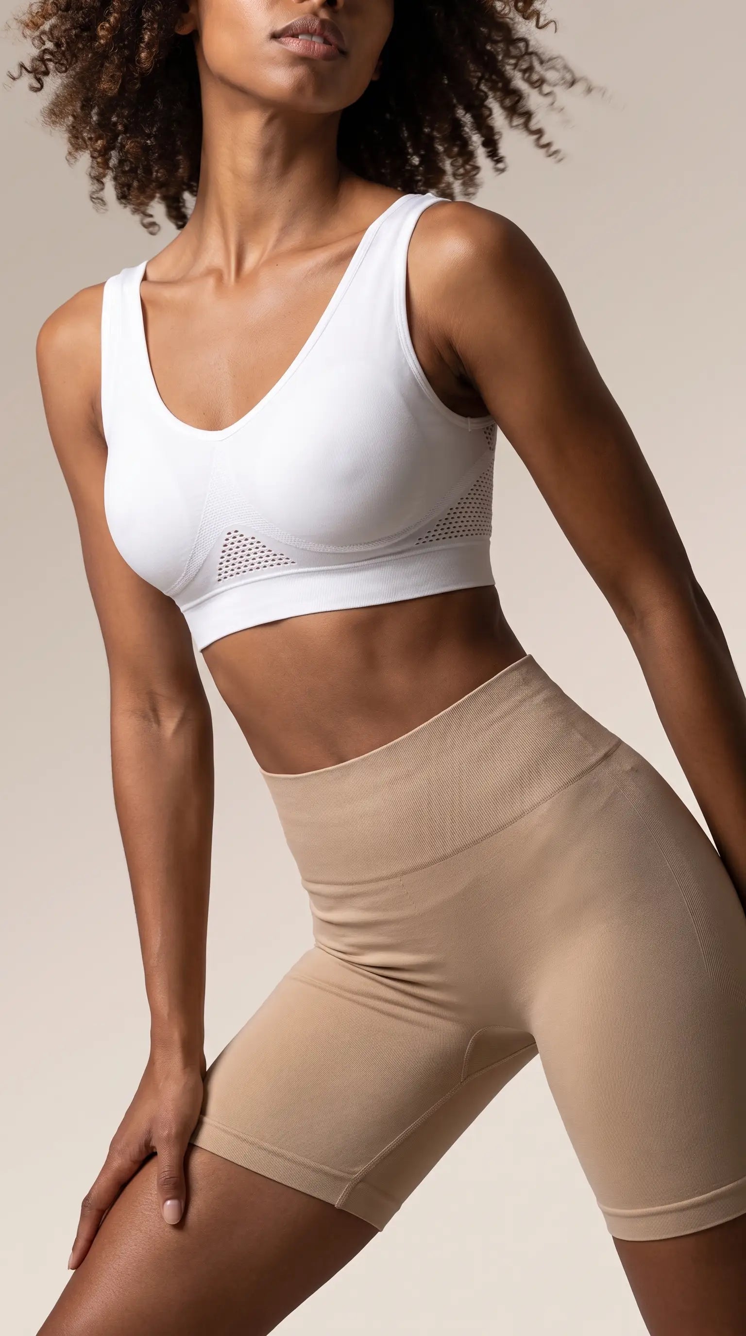Vintage Style Comfortable Aire Posture Corrector Lift Up Bra worn with beige shorts on a model.