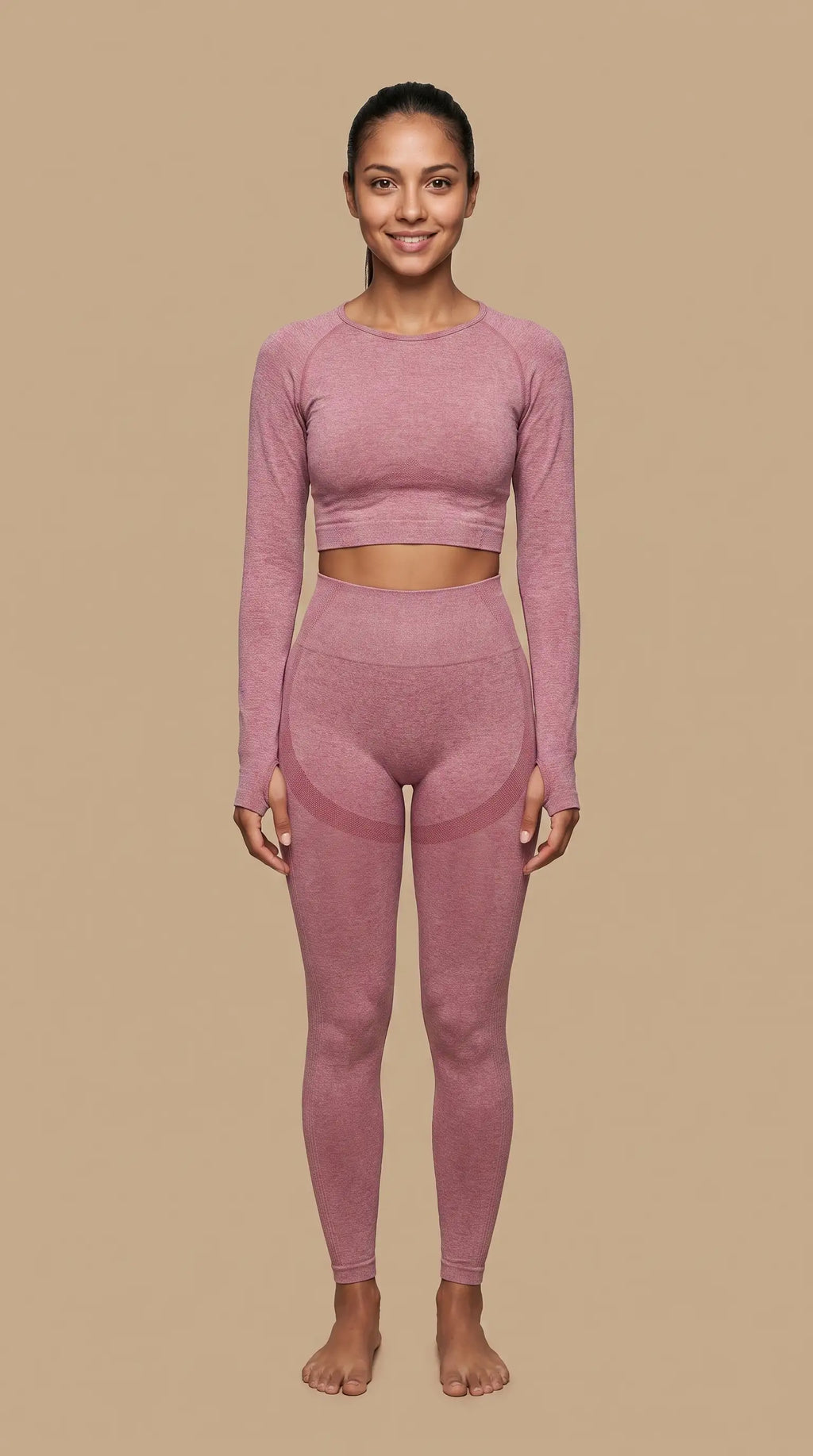 New Seamless High Waist Leggings model wearing a pink cropped top and matching leggings, showcasing all-day comfort and performance.