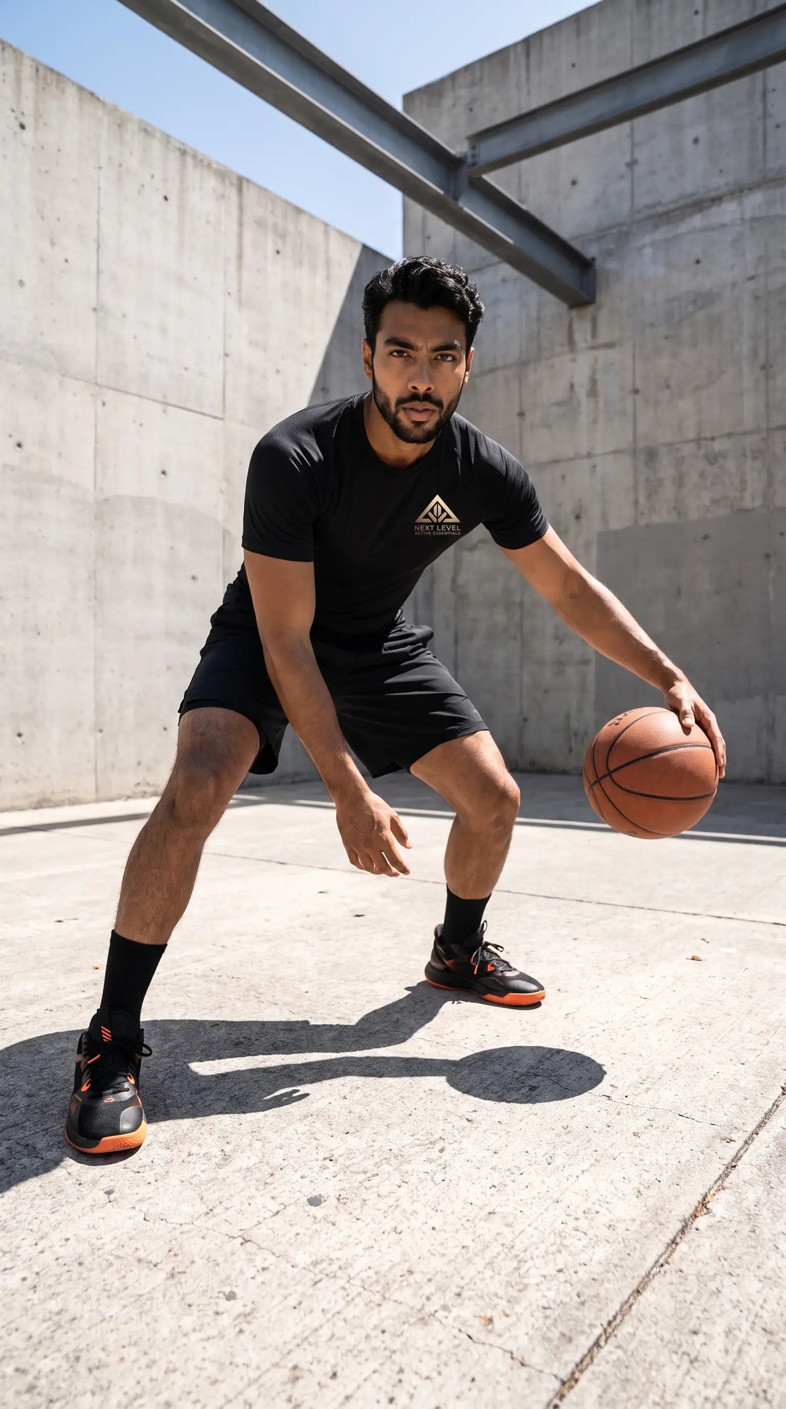 Men's quick-dry performance training compression shirt, athlete dribbling basketball in urban setting.