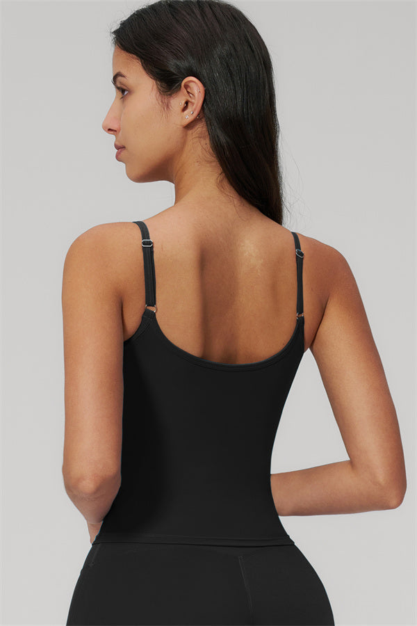 The Rapture Tank Top Flared Leggings 2-Piece Set featuring a model wearing the black tank from the back.