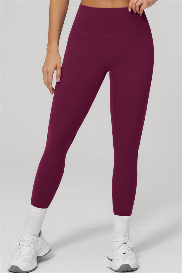 The Rapture Sports Bra Leggings 2-Piece Set featuring high-waisted maroon leggings for a flattering fit and everyday comfort.