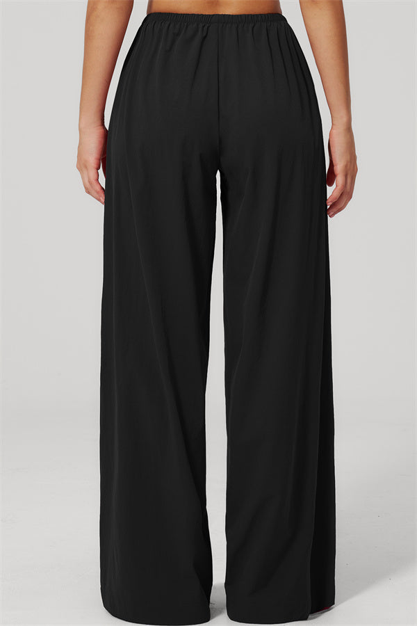 Back view of The Spunk UV protection Jacket Sweatpants 2-Piece Set sweatpants, showcasing their relaxed fit and design.