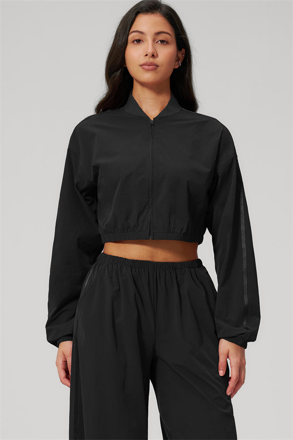 The Spunk UV protection Jacket Sweatpants 2-Piece Set, showcasing a stylish black crop jacket and matching sweatpants.