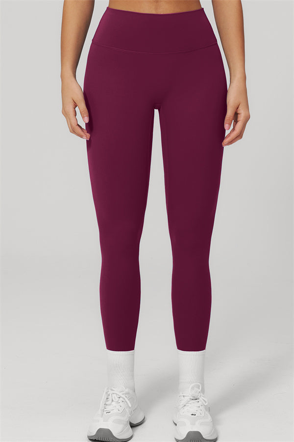 The Rapture Sports Bra Leggings 2-Piece Set featuring high-waisted leggings in a sleek burgundy color.