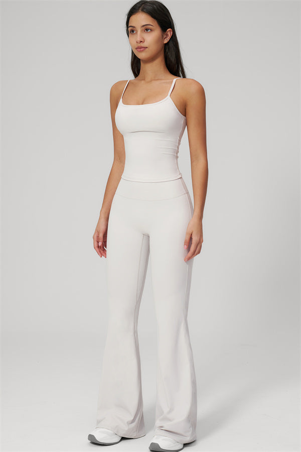 The Rapture Tank Top Flared Leggings 2-Piece Set in light color, model wearing stylish outfit with flared leggings.