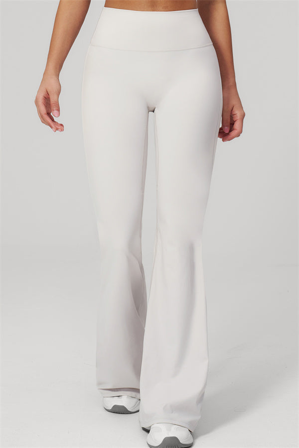 The Rapture Tank Top Flared Leggings 2-Piece Set featuring flared leggings in a light color.