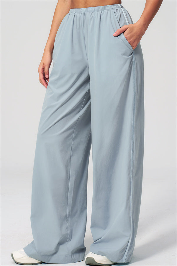 The Spunk UV protection Jacket Sweatpants 2-Piece Set in light blue, featuring relaxed fit sweatpants with pockets.