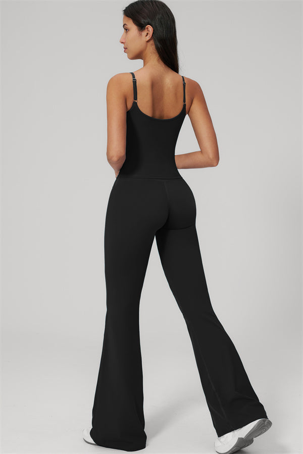 Model wearing The Rapture Tank Top Flared Leggings 2-Piece Set, showcasing the back view in stylish black.