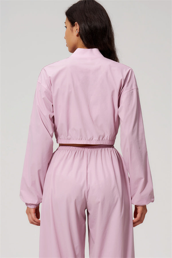 The Spunk UV protection Jacket Sweatpants 2-Piece Set displayed from the back, showcasing its relaxed fit and sporty design.