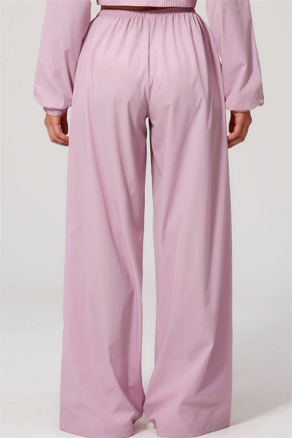 The Spunk UV protection Jacket Sweatpants 2-Piece Set shown from the back, featuring relaxed-fit pink sweatpants.