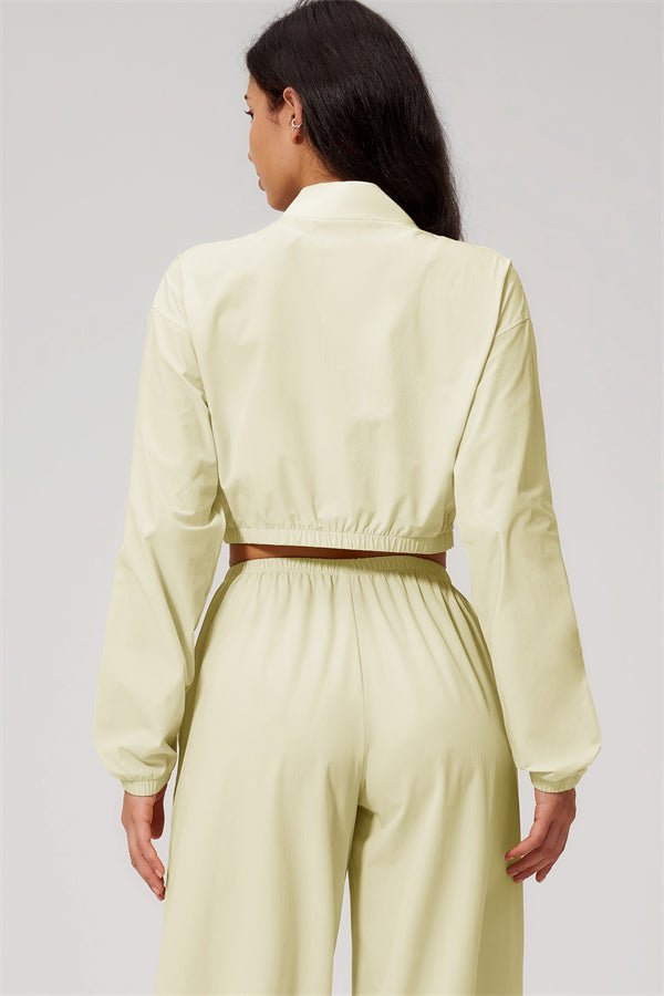 Back view of The Spunk UV protection Jacket Sweatpants 2-Piece Set in light color, showing relaxed fit and cropped jacket style.