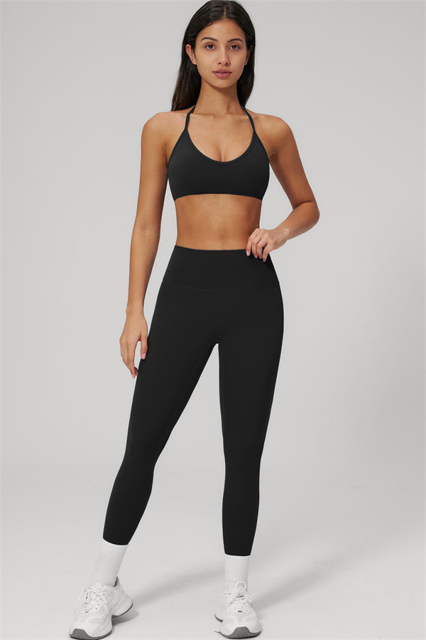 Model wearing The Rapture Sports Bra Leggings 2-Piece Set, showcasing comfort and a flattering fit for activewear.
