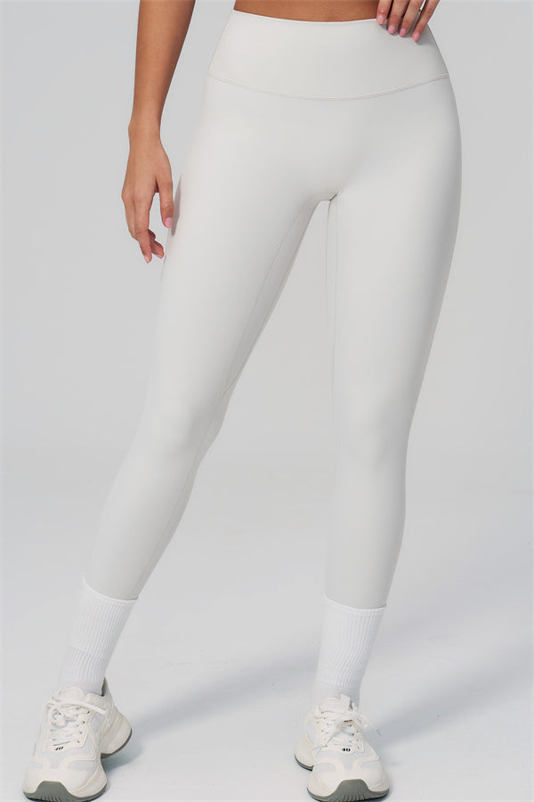 The Rapture Sports Bra Leggings 2-Piece Set featuring high-waisted white leggings perfect for comfort and performance.