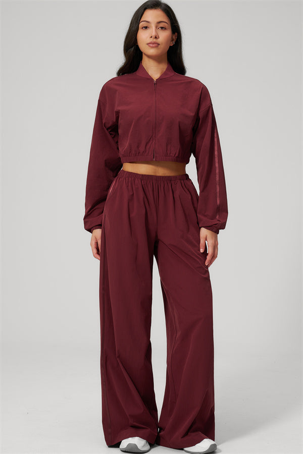 The Spunk UV protection Jacket Sweatpants 2-Piece Set in burgundy, showcasing a modern sporty design for comfort and style.