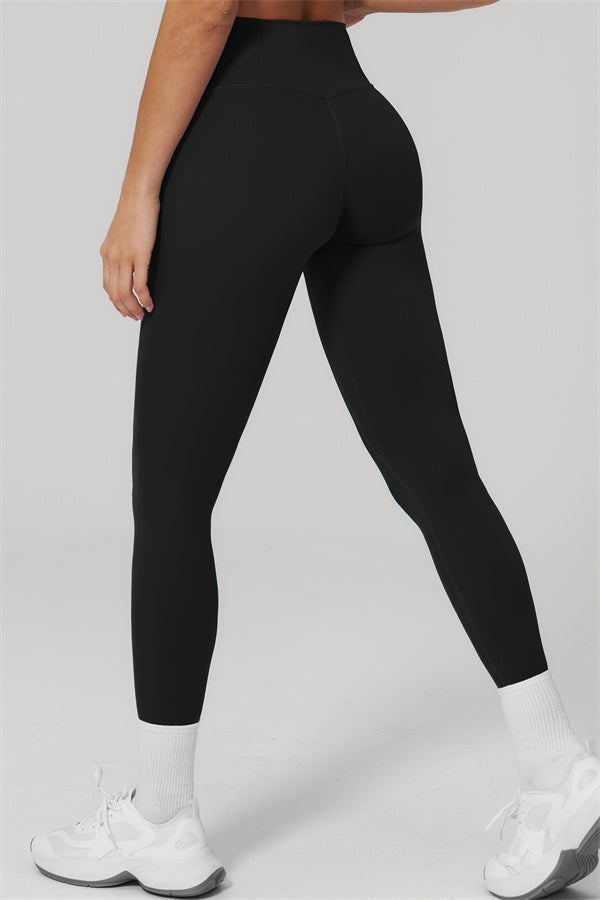 The Rapture Sports Bra Leggings 2-Piece Set featuring high-waisted leggings shown from the back in black.