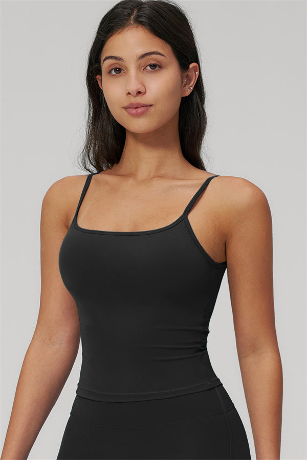 The Rapture Tank Top Flared Leggings 2-Piece Set featuring a stylish black tank top on a model.