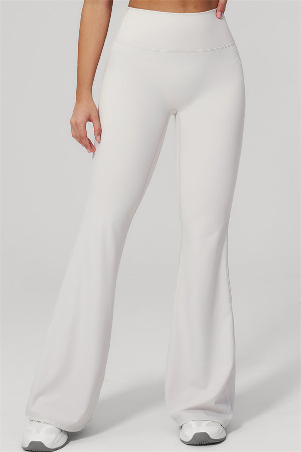 The Rapture Tank Top Flared Leggings 2-Piece Set featuring stylish flared leggings in a light color.