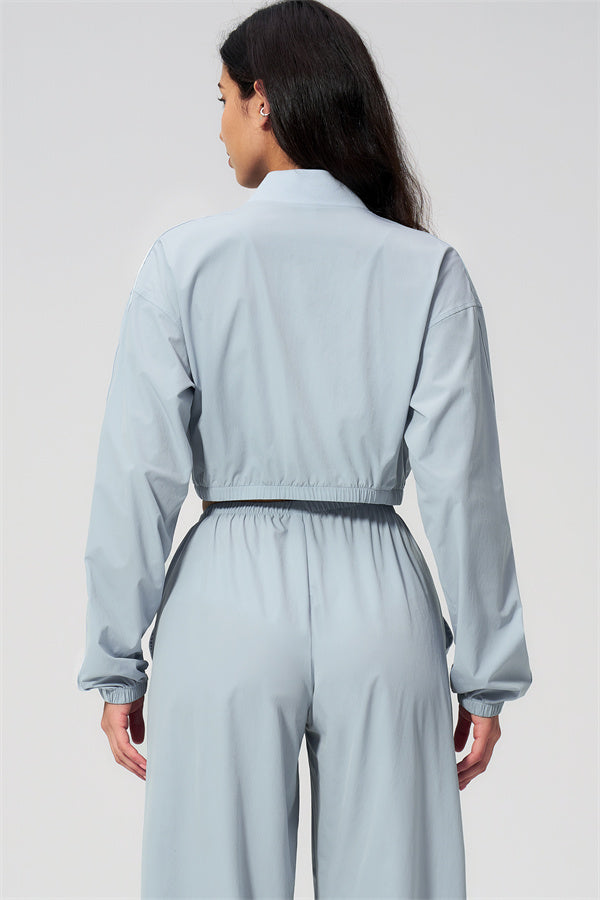 Back view of The Spunk UV protection Jacket Sweatpants 2-Piece Set in light blue showing sporty silhouette.