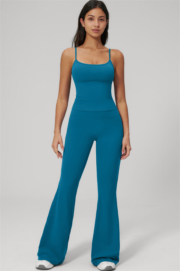 The Rapture Tank Top Flared Leggings 2-Piece Set in teal worn by a model, showcasing a stylish and comfortable outfit.