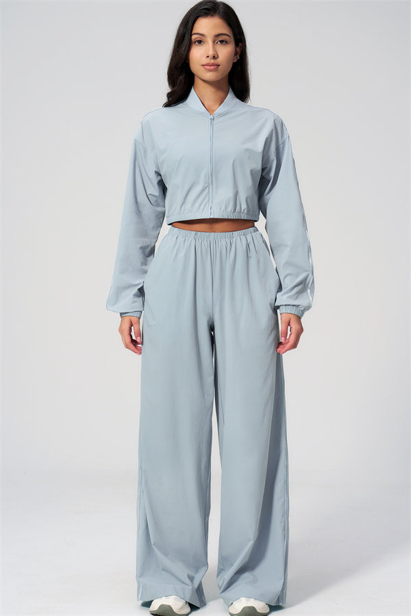 The Spunk UV protection Jacket Sweatpants 2-Piece Set shown on a model, featuring a cropped jacket and wide-leg sweatpants.