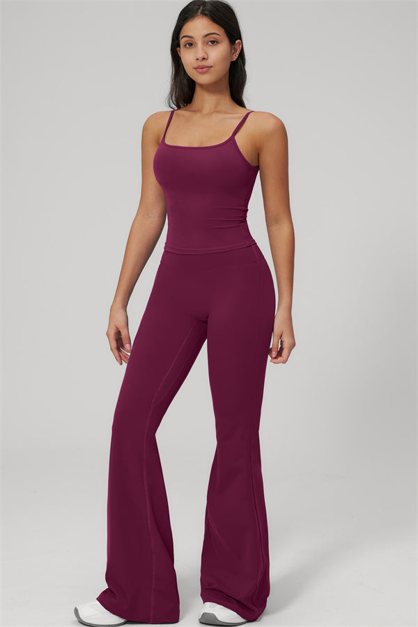 The Rapture Tank Top Flared Leggings 2-Piece Set worn by a model in a burgundy color.