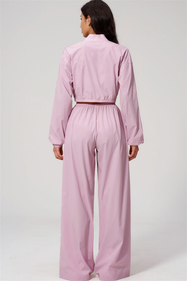 The Spunk UV protection Jacket Sweatpants 2-Piece Set featuring a relaxed fit in pink, designed for comfort and style.