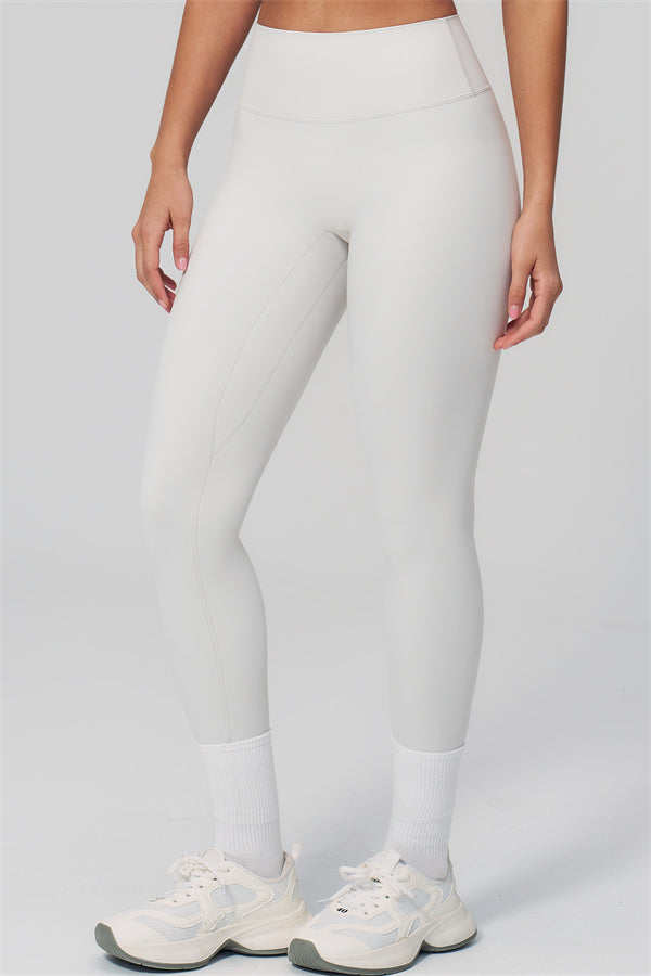 The Rapture Sports Bra Leggings 2-Piece Set featuring high-waisted leggings in a soft, white fabric for comfort and style.