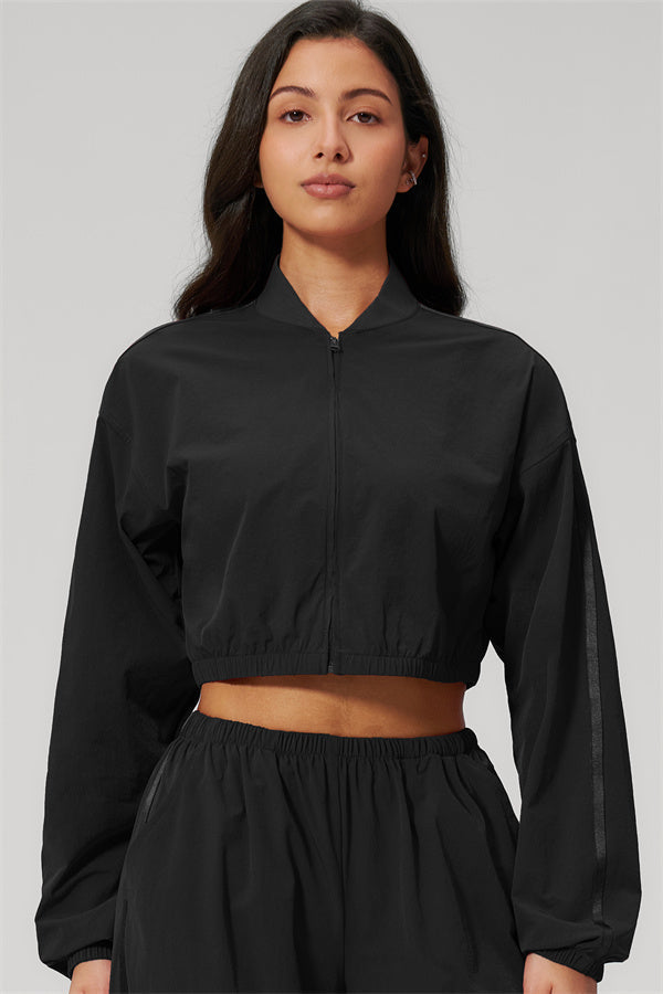 The Spunk UV protection Jacket Sweatpants 2-Piece Set featuring a black cropped jacket with a zip front.