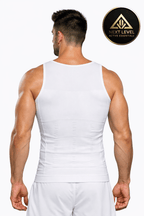 Men’s Slimming Compression Vest Man wearing a white Compression Vest with 'Next Level Active Essentials' logo.
