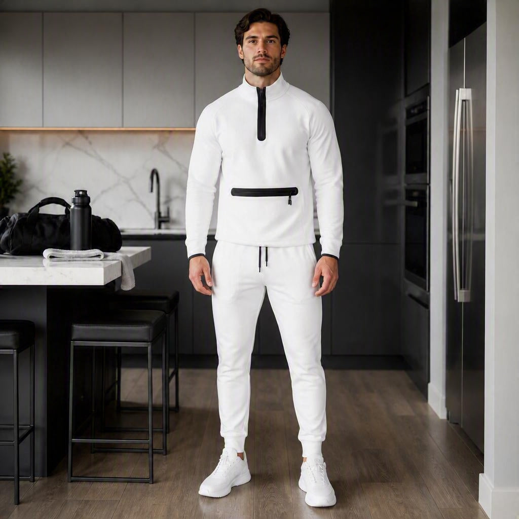 Men's Versa UltraTech Fleece Set model wearing stylish athletic outfit in modern kitchen