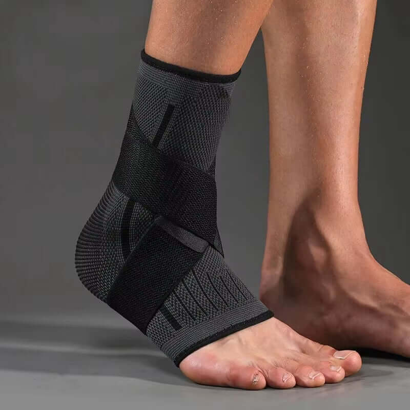 Ankle Support Brace with Adjustable Wrap, displaying the black and gray model, and showing the details of the adjustable strap 
