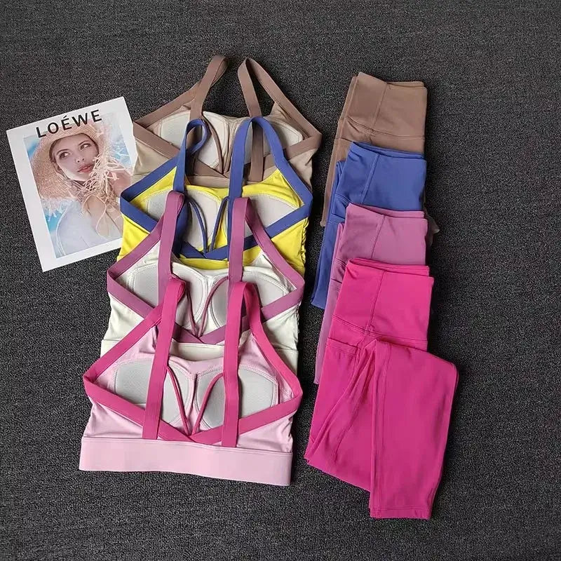 Women’s High-End Yoga Workout Set Colorful sports bra and leggings set with a Loewe magazine on a dark surface