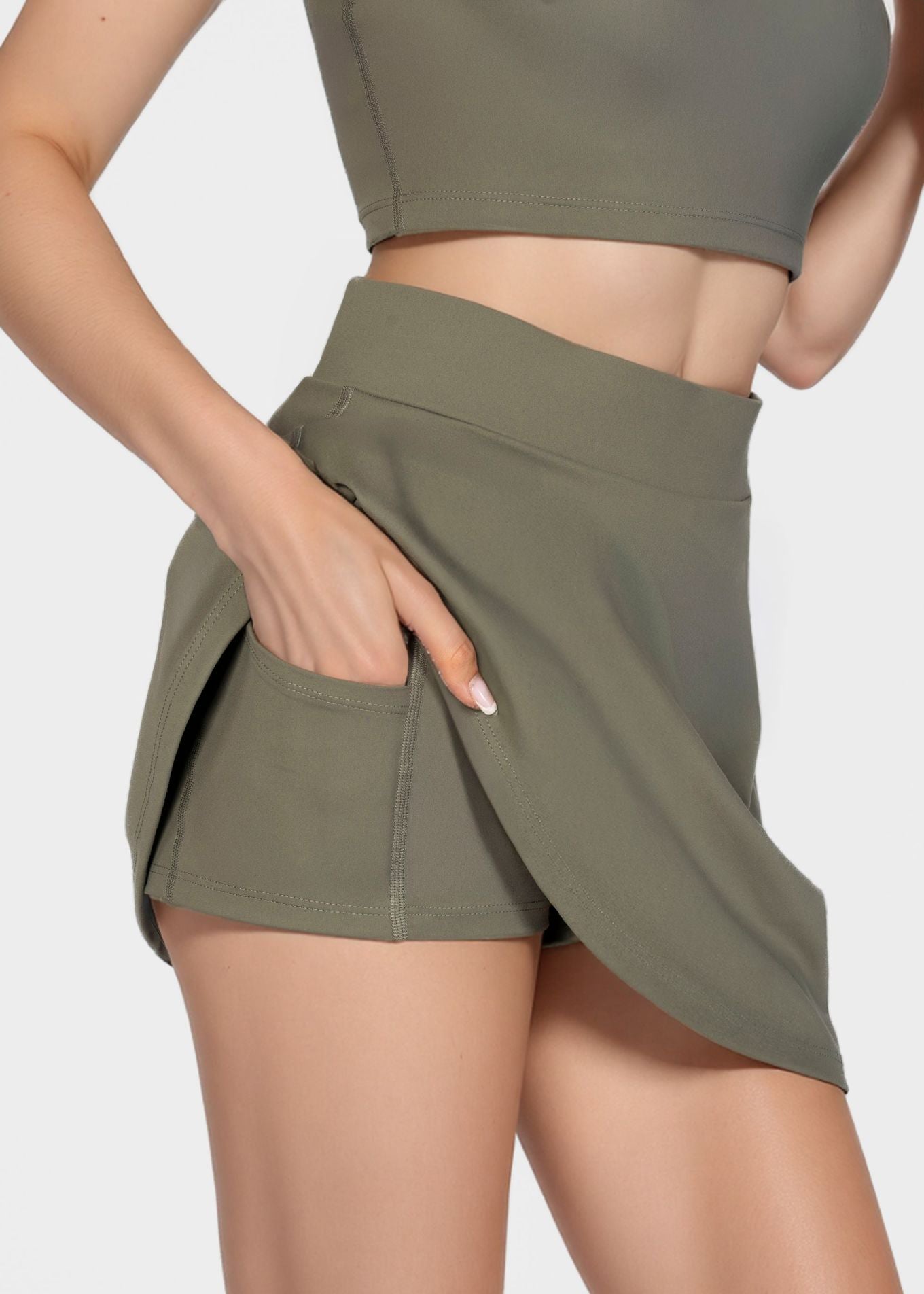 Built-in Pocket Short Tennis Skirt Made in USA featuring a stylish design and functional pocket shorts.