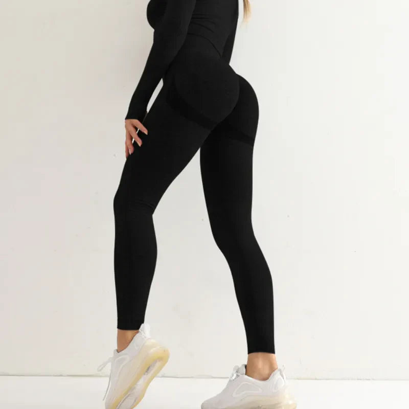 Model wearing New Seamless High Waist Leggings in black with stylish sneakers, showcasing comfort and fit.