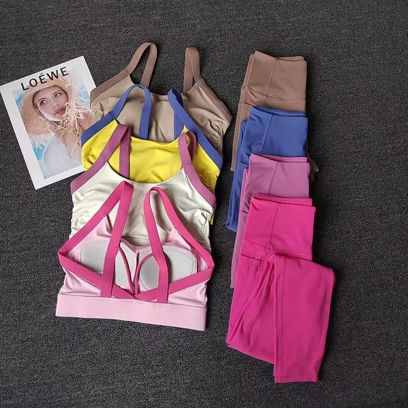 Women’s High-End Yoga Workout Set Colorful sports bra and leggings set with a Loewe magazine on a dark surface