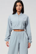 The Spunk UV protection Jacket Sweatpants 2-Piece Set featuring a light blue cropped jacket and matching sweatpants.