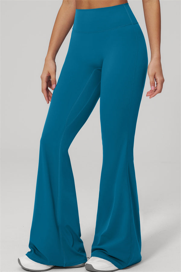 The Rapture Tank Top Flared Leggings 2-Piece Set featuring stylish flared leggings in teal color.