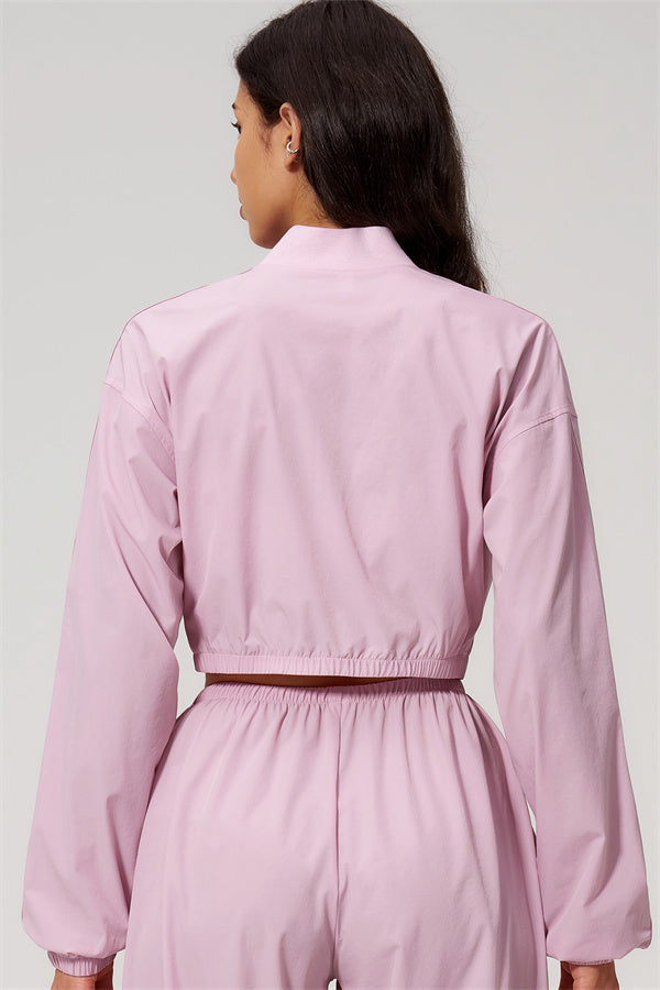 The Spunk UV protection Jacket Sweatpants 2-Piece Set shown from the back in pink color, demonstrating stylish design and comfort.