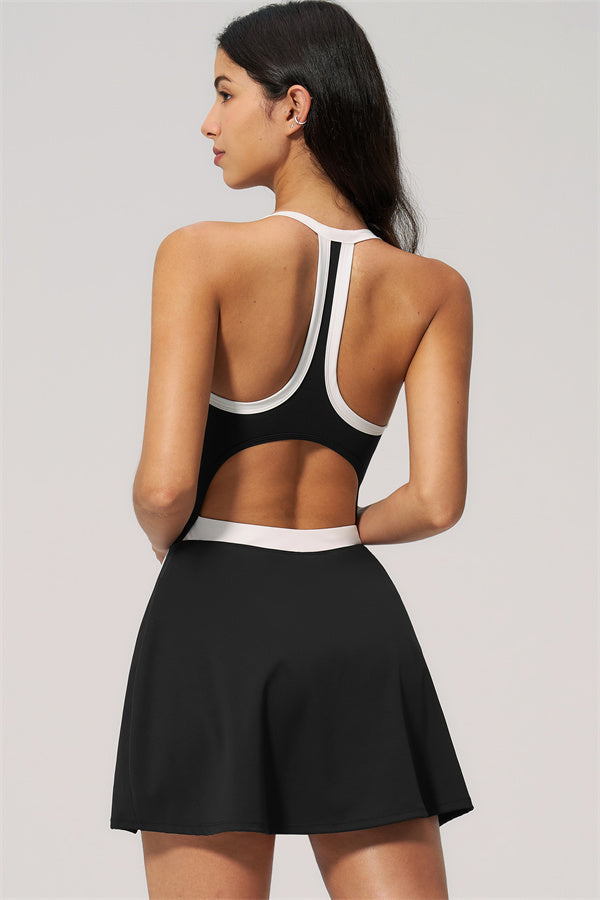 Back view of The New High End Spunk Tennis Dress showcasing its stylish cut and design details.