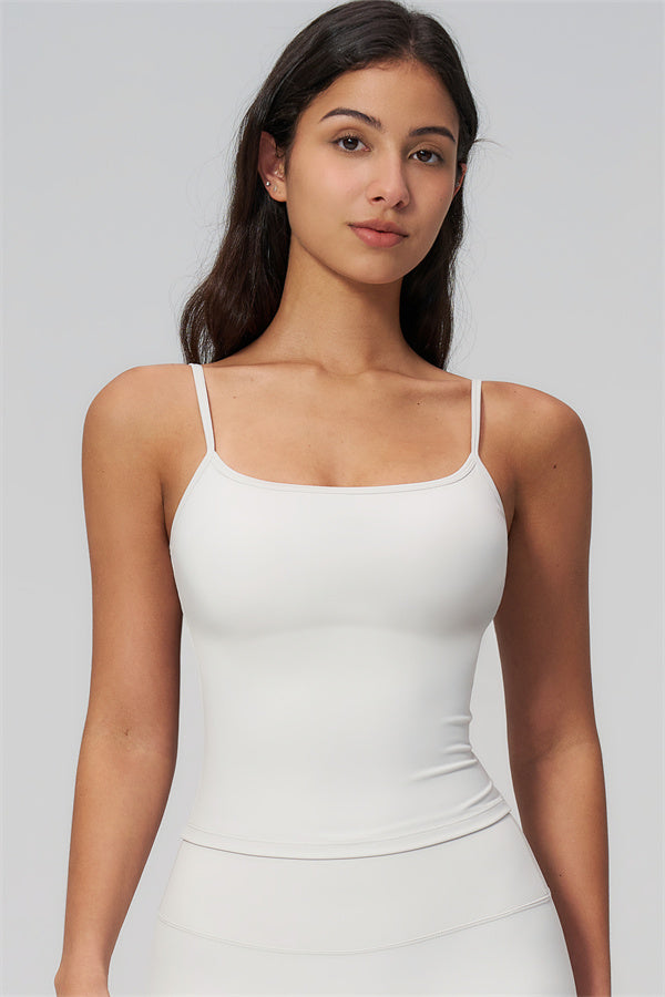 The Rapture Tank Top Flared Leggings 2-Piece Set featuring a sleek white tank top.