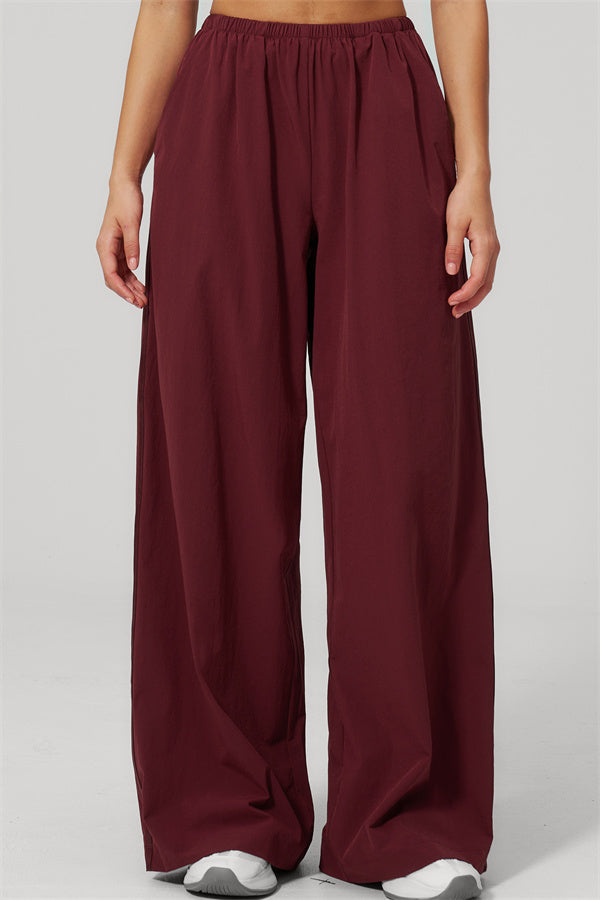 The Spunk UV protection Jacket Sweatpants 2-Piece Set featuring relaxed fit burgundy sweatpants with an elastic waistband.