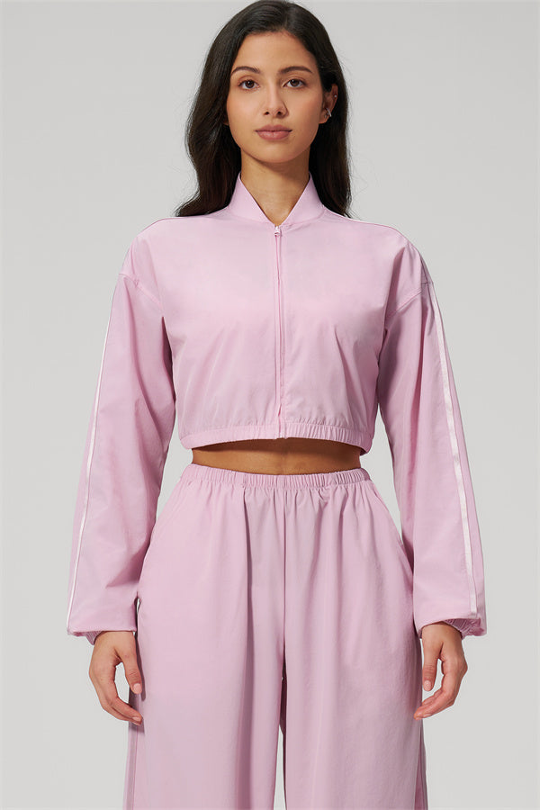 The Spunk UV protection Jacket Sweatpants 2-Piece Set in pink featuring a cropped jacket and matching sweatpants.