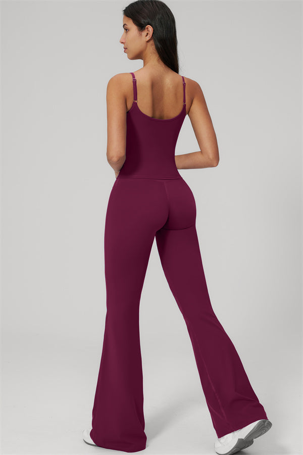 The Rapture Tank Top Flared Leggings 2-Piece Set shown on model from the back in burgundy.