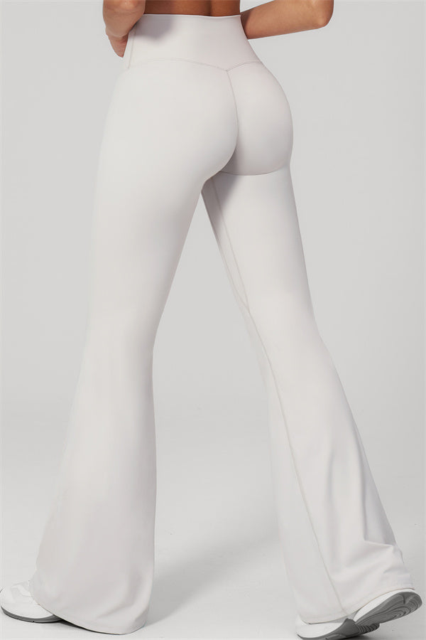 The Rapture Tank Top Flared Leggings 2-Piece Set featuring stylish flared leggings in a soft white color.