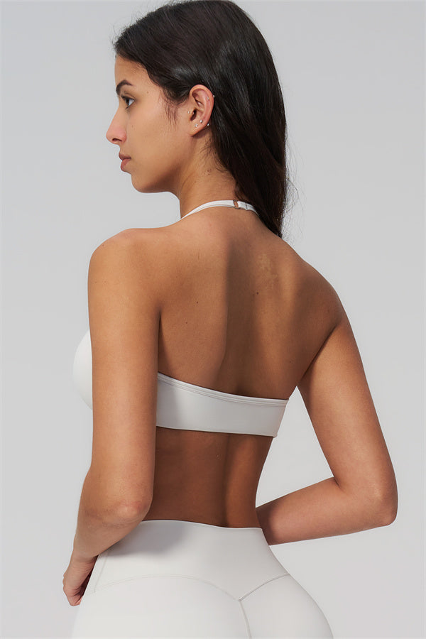 The Rapture Sports Bra Leggings 2-Piece Set in white, showcasing the back of the sports bra with a sleek halter neckline.