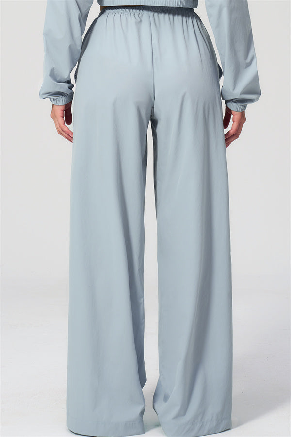 The Spunk UV protection Jacket Sweatpants 2-Piece Set featuring a back view of the light blue sweatpants.