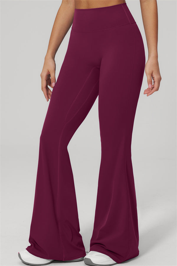 The Rapture Tank Top Flared Leggings 2-Piece Set featuring stylish flared leggings in a vibrant burgundy color.