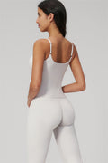 The Rapture Tank Top Flared Leggings 2-Piece Set worn by a model from the back, showcasing the design and fit.