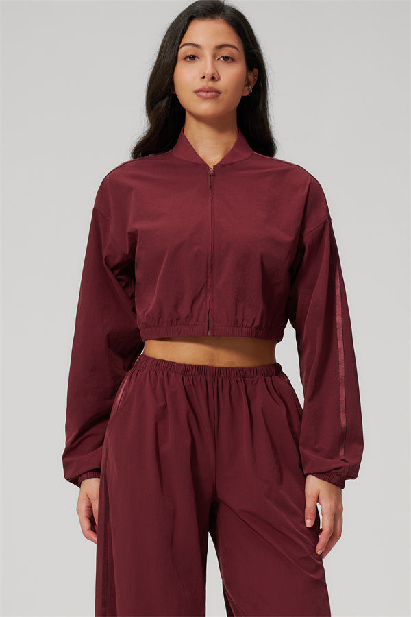 The Spunk UV protection Jacket Sweatpants 2-Piece Set in burgundy, featuring a relaxed sporty silhouette for everyday wear.