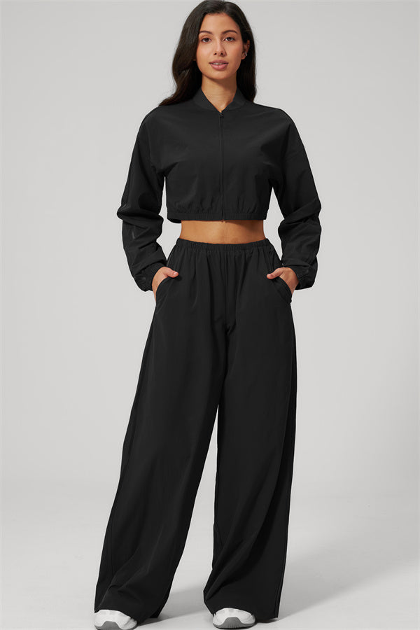 The Spunk UV protection Jacket Sweatpants 2-Piece Set in black, featuring a cropped jacket and relaxed pants.